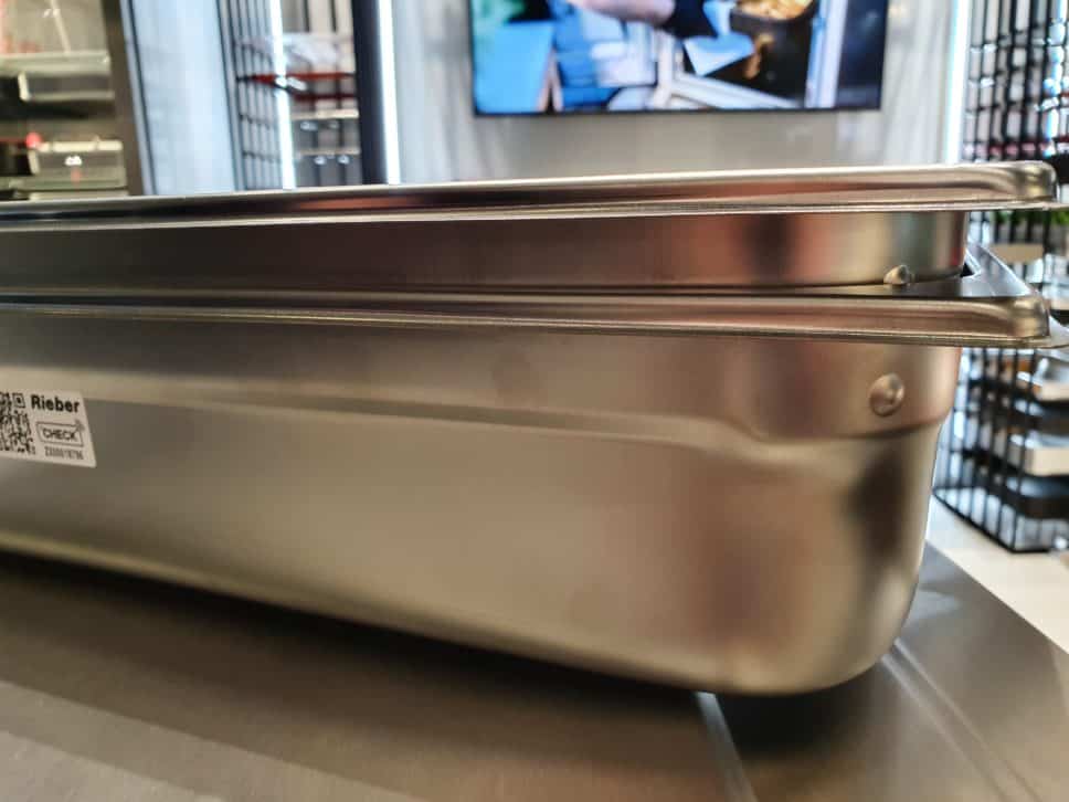 Rieber relaunches the GN pan with a "no nestle" stacking lug to stop pans clinging together